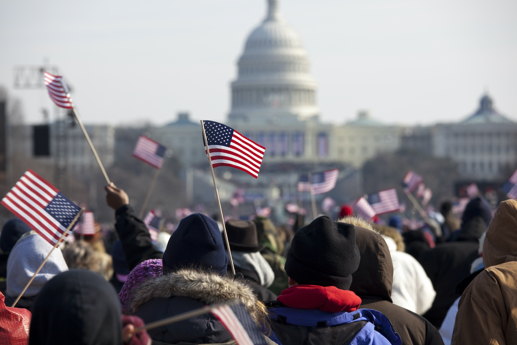 inauguration day waving flags at capitol
