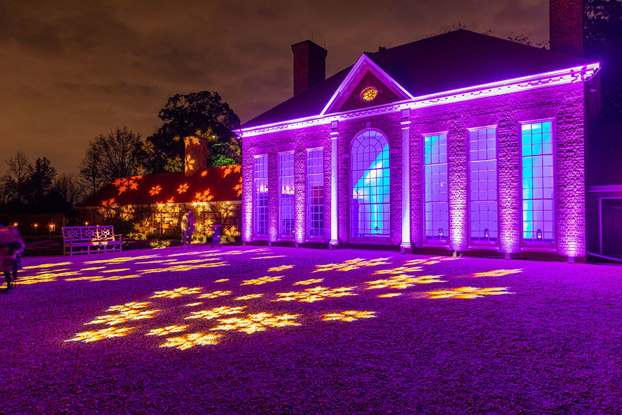 Mount Vernon estate lite up for the holidays in pink lights with snowflakes