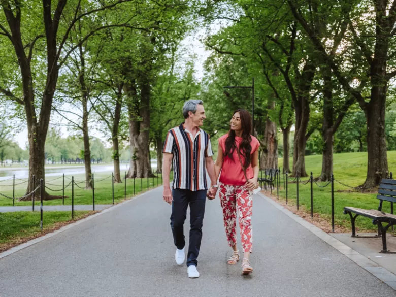 Couple Walking Through National Mall