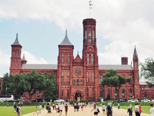 @travelwith_caro - Summer scene at the Smithsonian Castle on the National Mall - The best things to do this summer in Washington, DC
